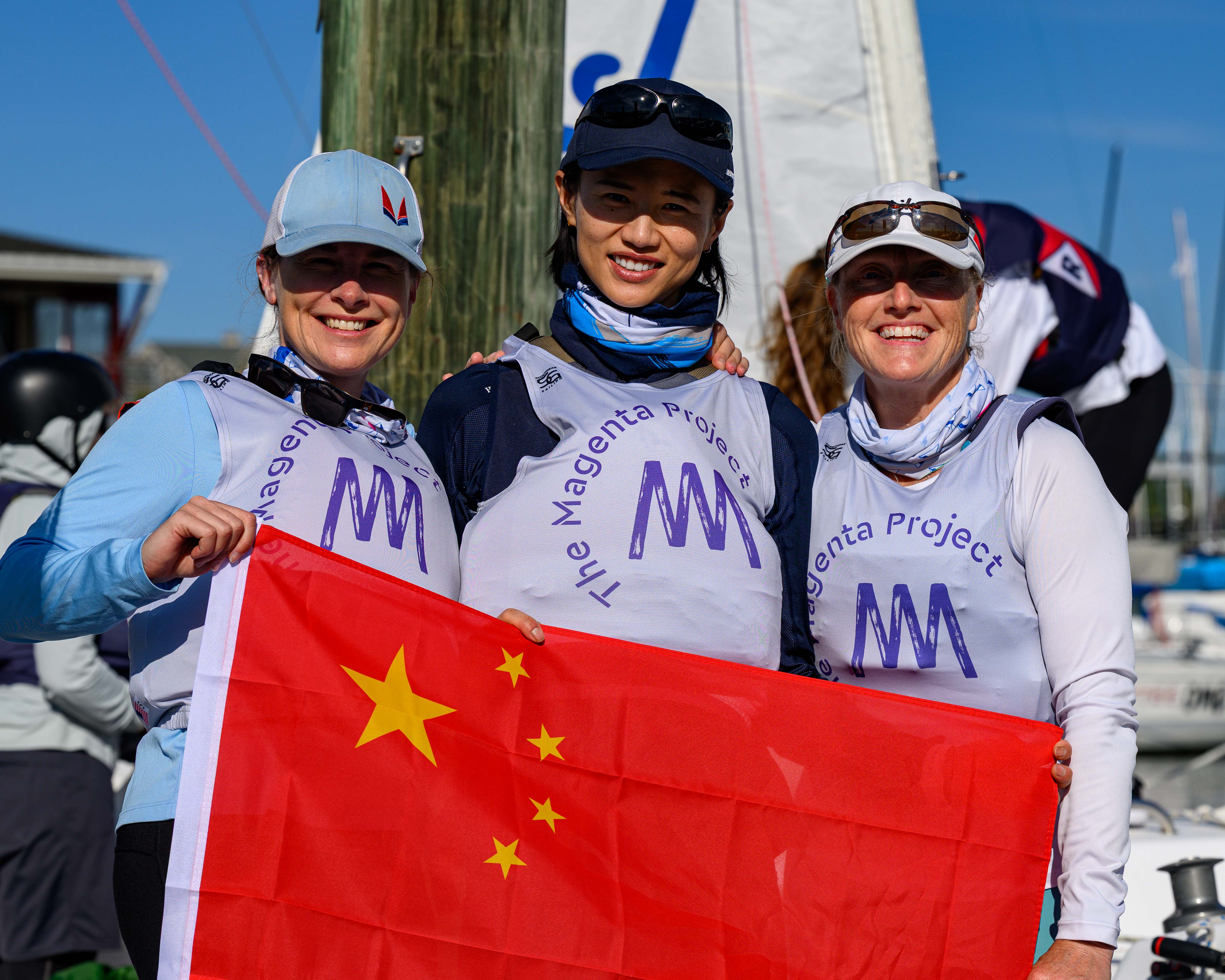 Team holding the flag of China